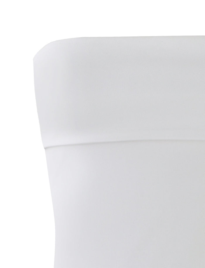 Close-up of the "DARIELLE TOP - WHITE" from TIGERMIST. This strapless, off-the-shoulder garment features smooth fabric with a subtle sheen and a straight, folded-over neckline. The background is not visible due to the zoomed-in focus on the upper part of the top.