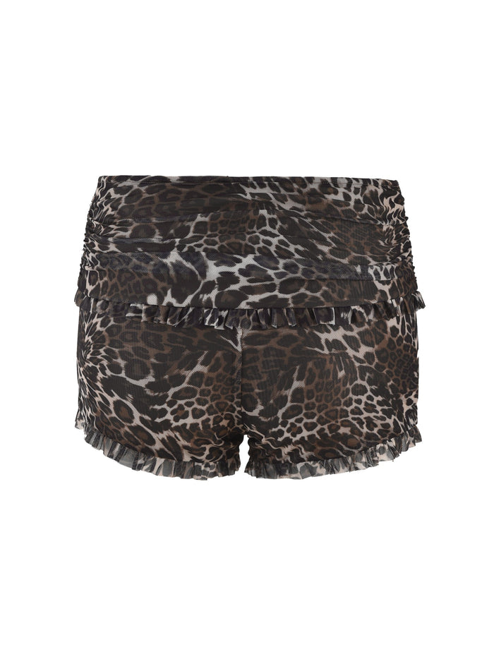 The GINNY SHORT - NEUTRAL : LEOPARD by TIGERMIST highlights a bodycon silhouette with ruched detailing and ruffled hems, featuring a lightweight and stretchy fabric that offers both boldness and comfort. Set against a plain white background, these shorts effortlessly stand out.