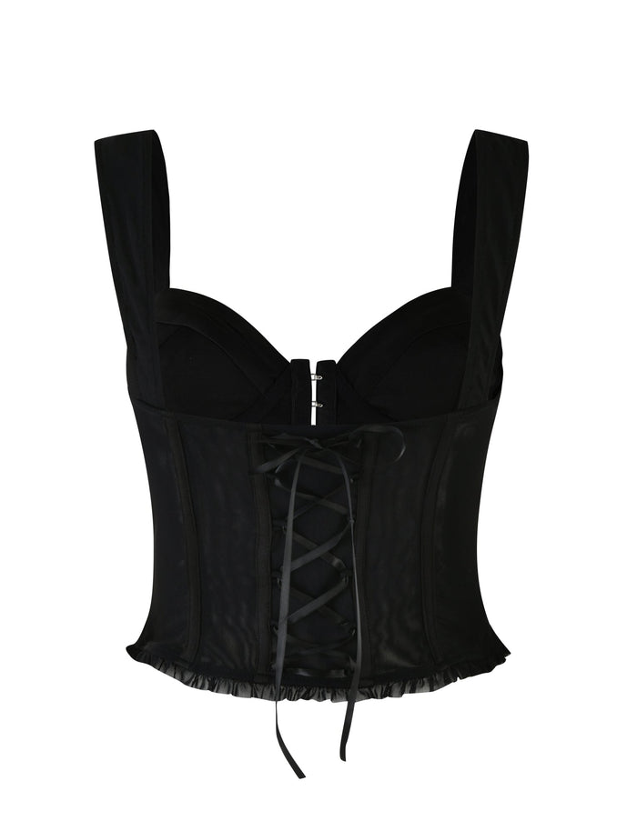 The GINNY TOP - BLACK by TIGERMIST is a corset-style piece featuring wide shoulder straps. It showcases a lace-up front, subtle ruffled trim along the bottom edge, and structured seams for a fitted appearance. With its sweetheart neckline, this top exudes elegance against its plain white background.