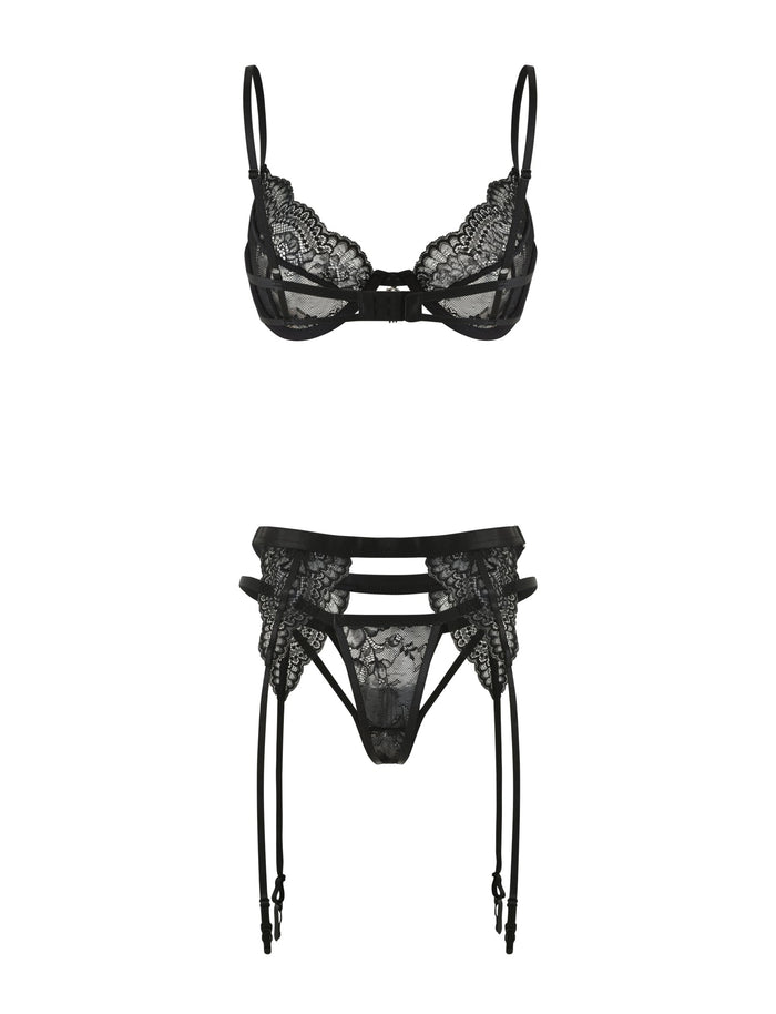 The JORDAN SET - BLACK by TIGERMIST features a black lace underwire bra with floral detailing and a garter belt with thigh straps, elegantly displayed against a white background.