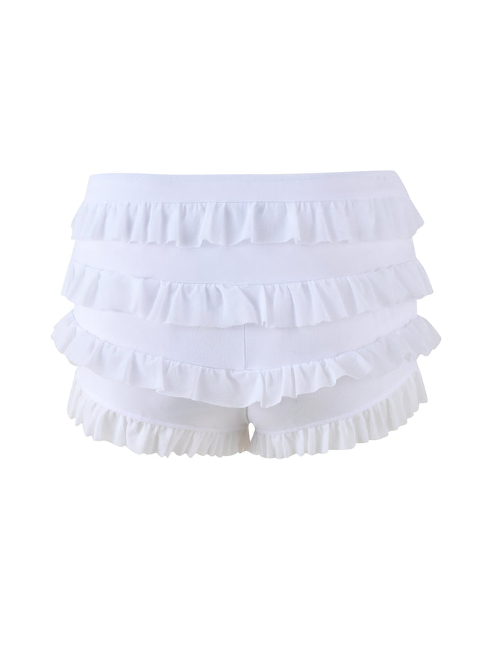 MIKEL SHORT - WHITE by TIGERMIST features a front view showcasing frilly white shorts with multiple layers of ruffle details and an elasticated waist.