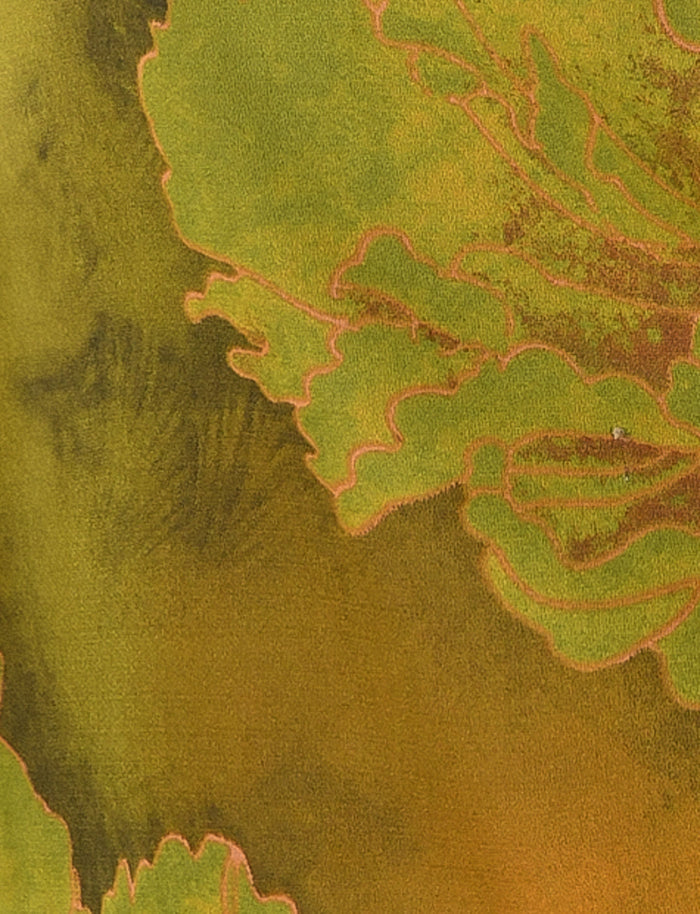 Close-up image of the MONROE TOP - GREEN: FLORAL by TIGERMIST showcasing intricate, vein-like patterns in varying shades of green and yellow. The top's edges, reminiscent of a floral watercolor print, are highlighted in a reddish-pink color, contrasting with the more muted background. The image captures the natural detail and texture of the fabric.