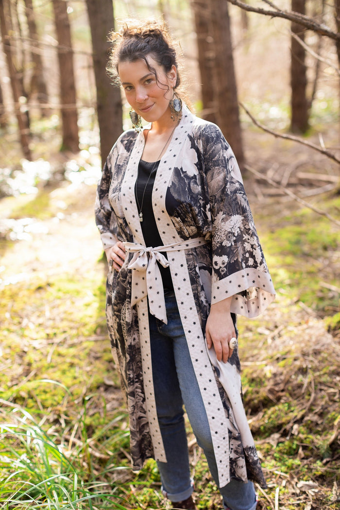 Model wearing Looking Glass Opera Robe featuring grown-up Alice Liddell, Victorian botanicals, and celestial star and moon accents inspired by Wonderland – Market of Stars.
