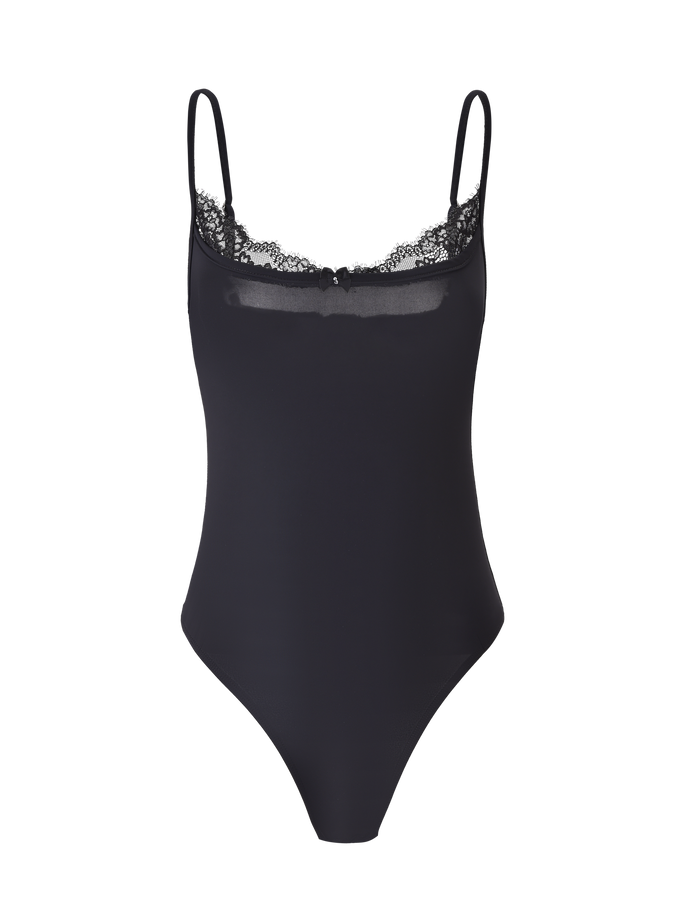 The TIGERMIST ASTRID BODYSUIT in black features thin straps, lace-trimmed neckline, and a body-con fit, shown on a plain background.