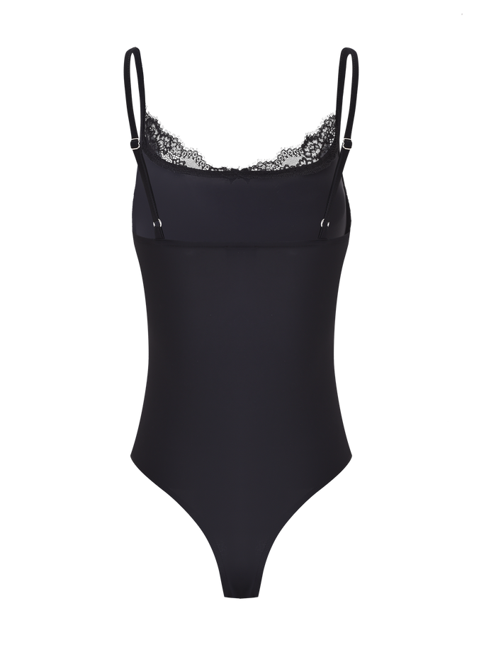 The TIGERMIST ASTRID BODYSUIT in black features adjustable straps and delicate lace trim along the neckline, shown against a plain white background.