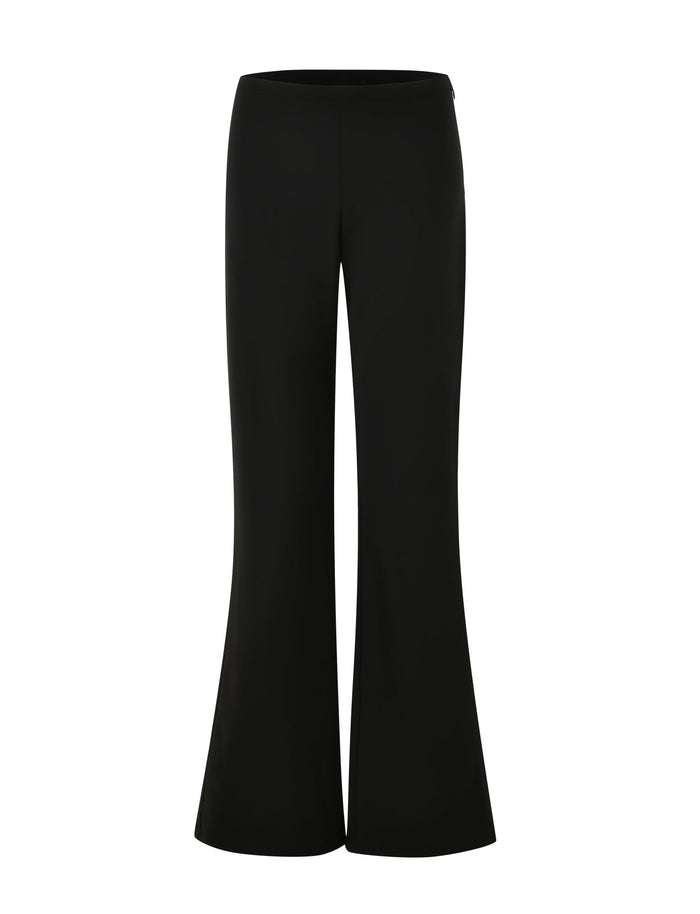 The AUDRIE PANT - BLACK by TIGERMIST is showcased against a white background. Crafted from suiting fabrication, these high-waisted pants feature a sleek, smooth texture and flared legs that widen from the knee to the bottom hem. A faux leather belt elegantly enhances their sophisticated look.
