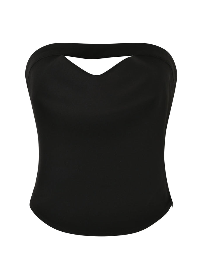 The AUDRIE TOP - BLACK by TIGERMIST is a chic and elegant black, mid-length top featuring a strapless sweetheart neckline on a plain white background. Its smooth fabric and sleek design exude sophistication.