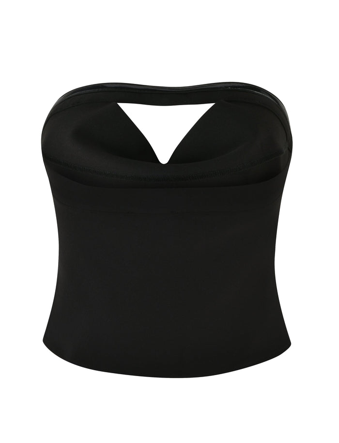 The AUDRIE TOP - BLACK by TIGERMIST is a sleek strapless piece featuring a distinctive V-neck cutout design and a mid-length fit. Crafted from smooth and stretchy fabric for a tailored, fitted look, this minimalist top combines style and versatility, making it ideal for various occasions.