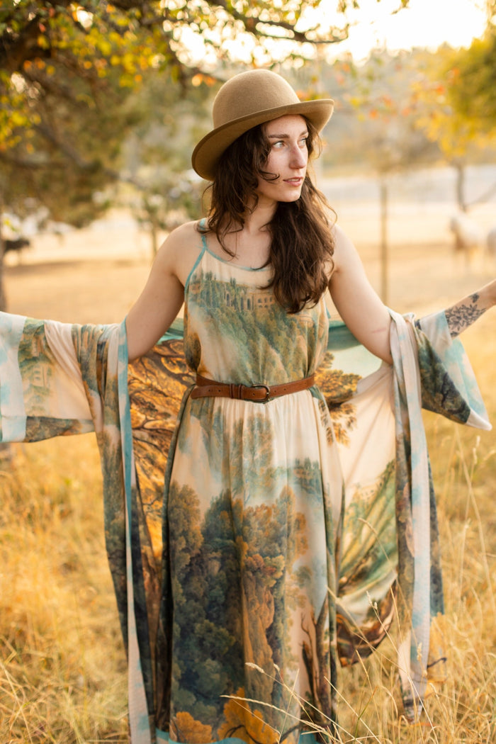 Soft bamboo viscose Bohéme slip dress featuring 18th-century Tivoli waterfalls and Lady Liberty artwork, designed to celebrate self-love and personal power – Market of Stars.