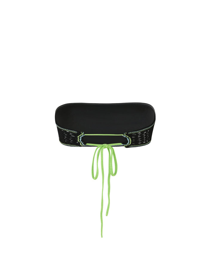 The AZARIA TOP - BLACK by TIGERMIST is a strapless bikini top featuring green lace-up detailing at the front. The laces form a criss-cross pattern and tie down the center, providing an adjustable closure. White stitching along the edges adds a stylish contrast to this design.