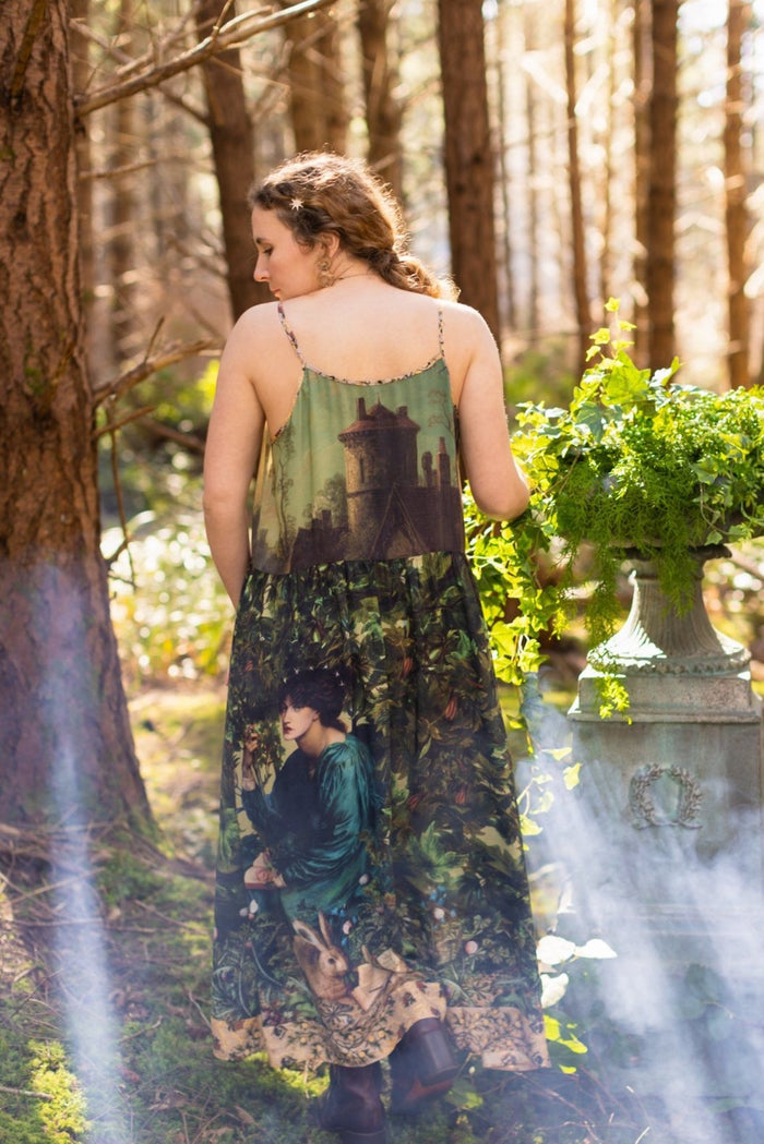 A romantic bamboo-based viscose slip dress featuring a moonlit river scene, a seated woman painted by Dante Gabriel Rossetti, and a hidden quote from a 1700s ring – Market of