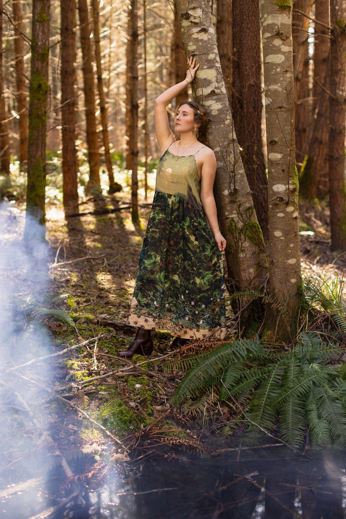 A romantic bamboo-based viscose slip dress featuring a moonlit river scene, a seated woman painted by Dante Gabriel Rossetti, and a hidden quote from a 1700s ring – Market of