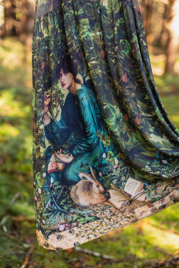 A romantic bamboo-based viscose slip dress featuring a moonlit river scene, a seated woman painted by Dante Gabriel Rossetti, and a hidden quote from a 1700s ring – Market of