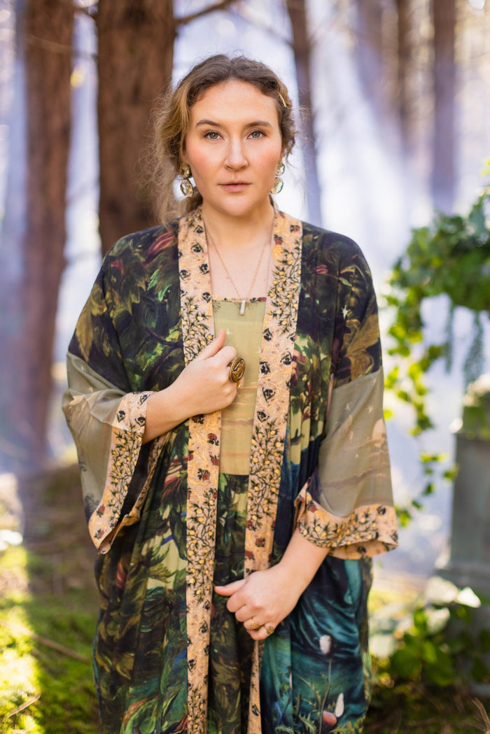 Romantic Bella Notte opera duster featuring Rossetti’s muse, a 16th-century rabbit, moonlit landscapes, and floral trim by William Morris – Market of Stars.
