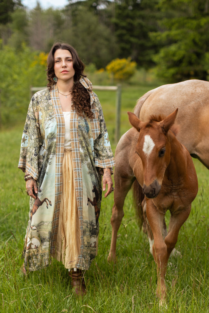 Model wearing a bamboo-viscose kimono duster robe made for everyday adventures with a whimsical print celebrating one's unbridled spirit of adventure - Market of Stars