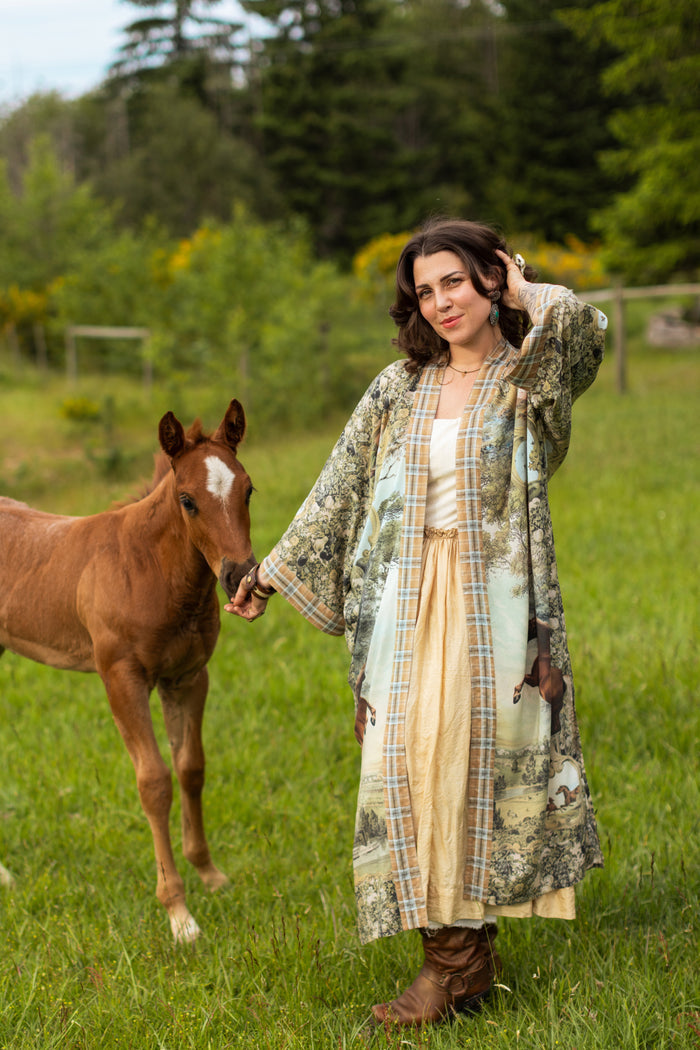 Model wearing a bamboo-viscose kimono duster robe made for everyday adventures with a whimsical print celebrating one's unbridled spirit of adventure - Market of Stars