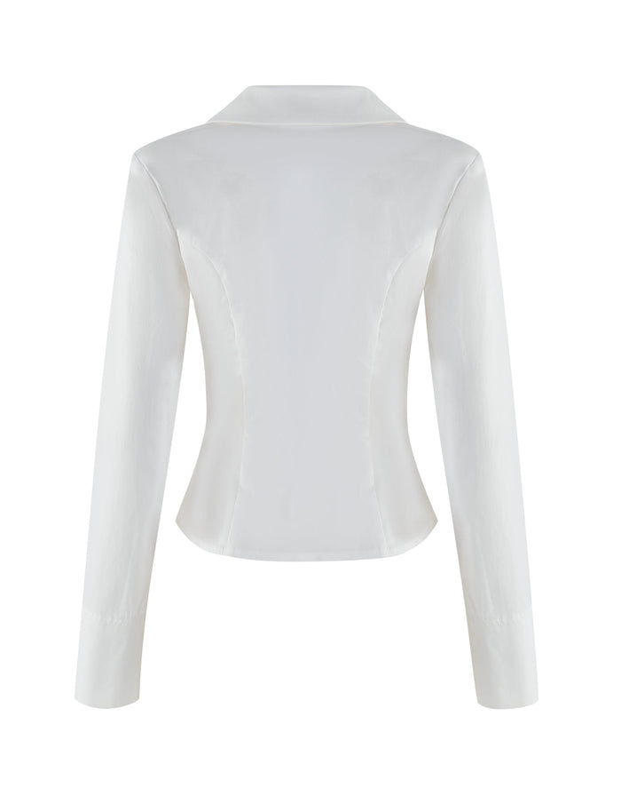 Back view of the TIGERMIST BRIELLE SHIRT - WHITE : IVORY, a long-sleeve blazer-style top with a fitted design in soft stretch fabric. It features a collar and slightly structured shoulders, echoing a classic white shirt look against a plain white backdrop.