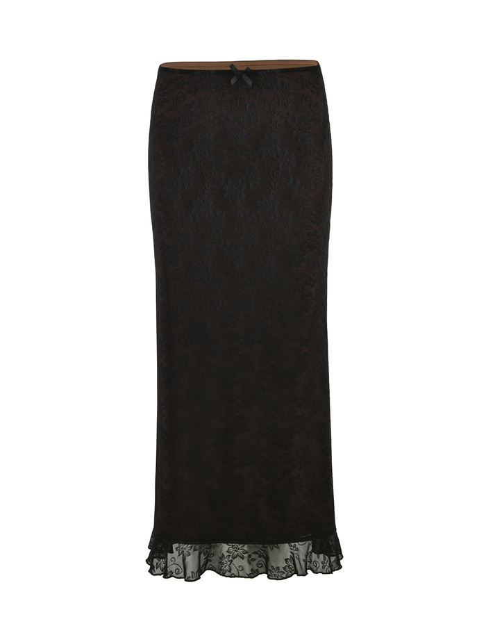 The CHARLEIGH SKIRT - BLACK : LACE by TIGERMIST is a long, fitted black lace skirt with a scalloped hem and a small black bow at the waist, shown on a white background.