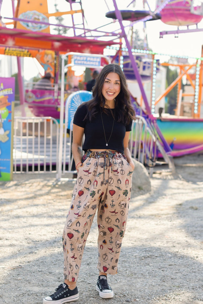 Charmed Life Artist Pants featuring playful Victorian luck charms and floral trim on breathable linen & bamboo/wood viscose – Market of Stars.