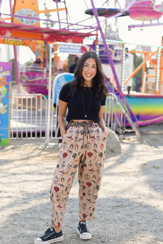 Charmed Life Artist Pants featuring playful Victorian luck charms and floral trim on breathable linen & bamboo/wood viscose – Market of Stars.