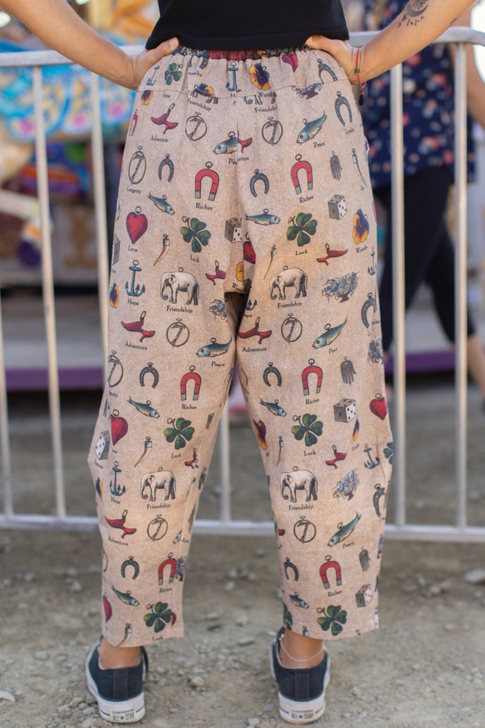 Charmed Life Artist Pants featuring playful Victorian luck charms and floral trim on breathable linen & bamboo/wood viscose – Market of Stars.