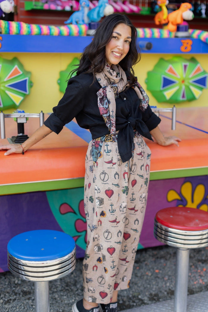 Charmed Life Artist Pants featuring playful Victorian luck charms and floral trim on breathable linen & bamboo/wood viscose – Market of Stars.