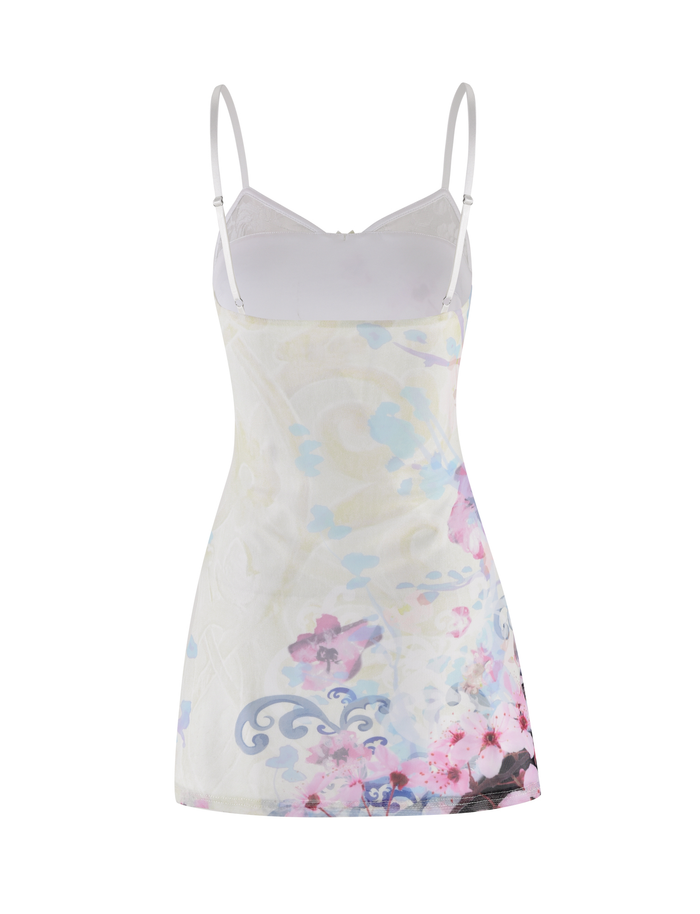 The TIGERMIST COLSON MESH MINI DRESS - MULTI: FLORAL: CHERRY BLOSSOM is a sleeveless white slip dress with adjustable thin straps, showcasing pastel floral and abstract swirls in pink, blue, and purple.