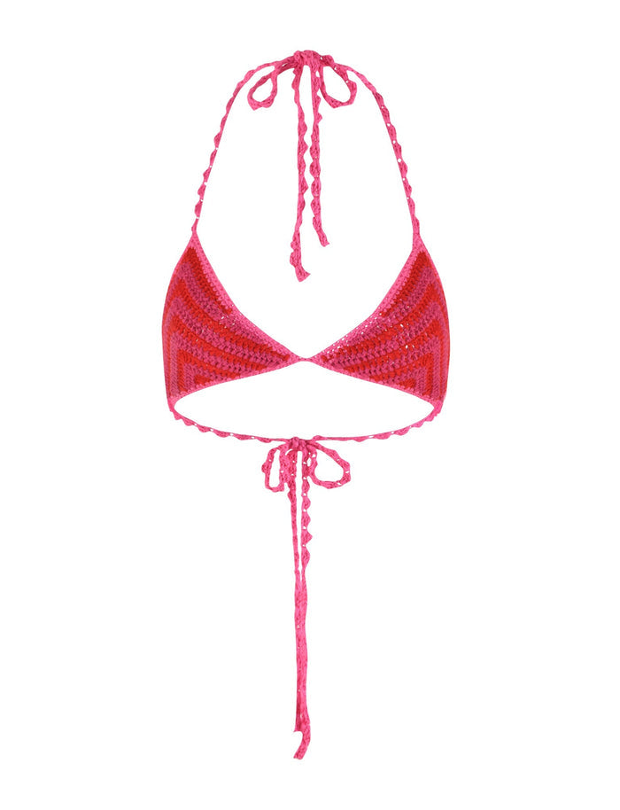 The CORA BIKINI TOP - PINK : STRIPE by TIGERMIST is a stunning crocheted piece showcasing a halter neckline with braided ties around the neck and back. Made from comfortable crochet fabric, its zigzag lines in various shades of pink deliver both style and texture.