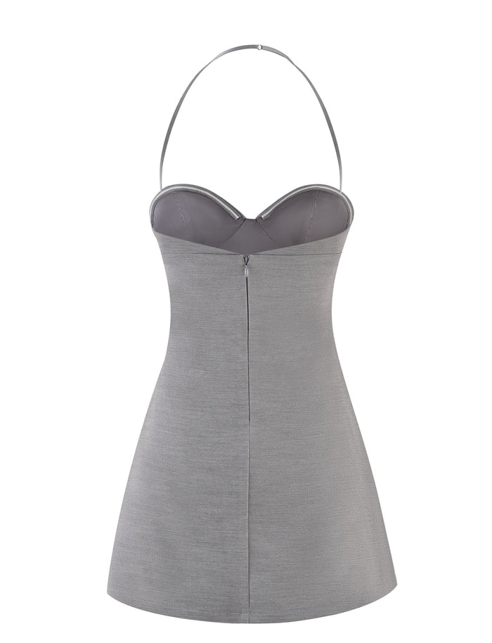 The DANICA DRESS - GREY by TIGERMIST is a sleeveless A-line dress featuring a subtle sweetheart neckline and a halter strap. This gray halter dress boasts a smooth texture and offers a flattering tailored fit at the waist.