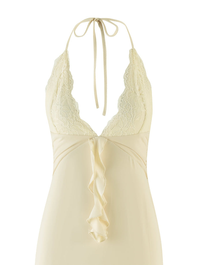 The DEENA MAXI DRESS - YELLOW : LEMON by TIGERMIST is a stunning yellow lace nightgown with a halter neck tie. It features intricately detailed lace bust cups and a deep V-neckline. A central ruffle accent adds charm beneath the bust, while the smooth, flowing fabric makes it an exquisite maxi-length choice for nightwear.