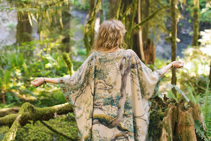 Model wearing the Earth and Sky Goddess length kimono featuring majestic trees by Charles Aston and antique moth illustrations – a dreamy tribute to nature – Market of Stars.