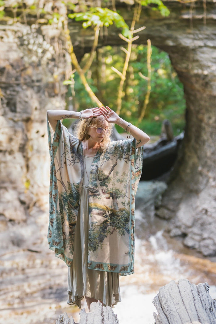 Model wearing the Earth and Sky Goddess length kimono featuring majestic trees by Charles Aston and antique moth illustrations – a dreamy tribute to nature – Market of Stars.
