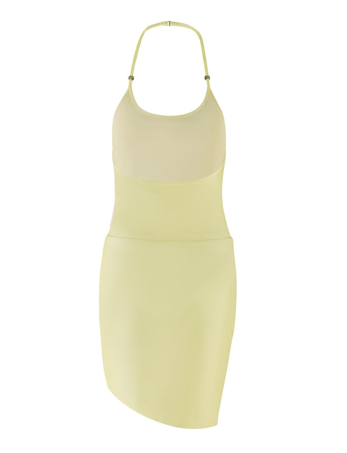 The ELYSIA DRESS - YELLOW : BUTTER by TIGERMIST is a light yellow halter neck dress featuring a mesh upper bodice and a fitted, asymmetrical skirt. Its sleek and simple design emphasizes your curves with a bodycon silhouette, free of any visible embellishments.
