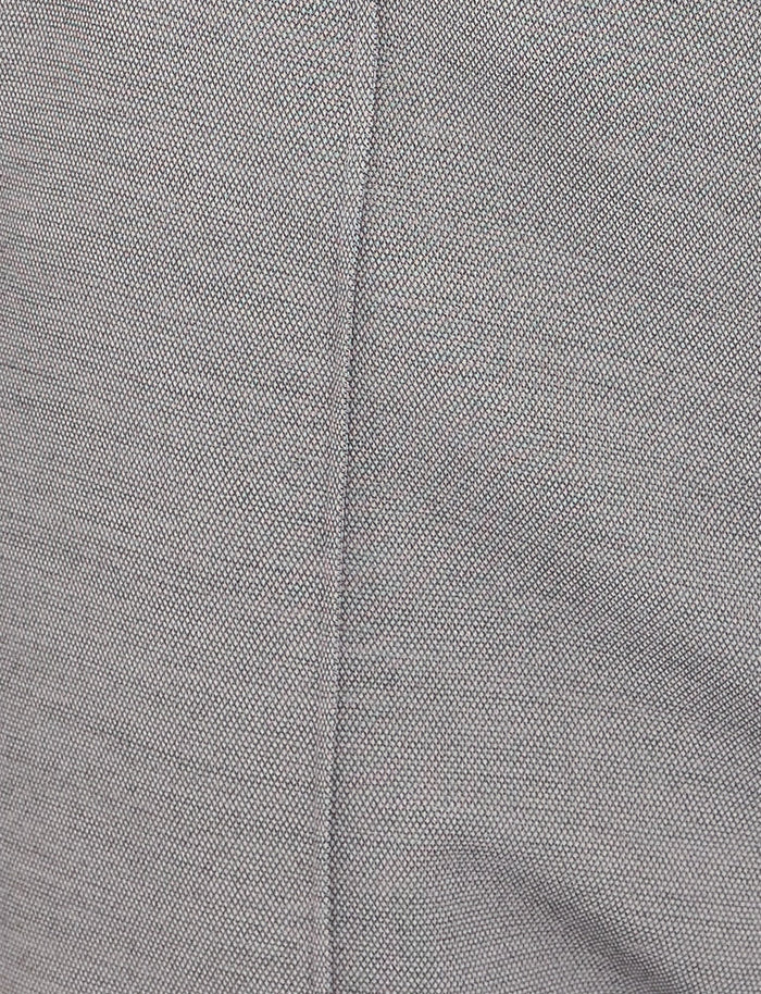 Close-up of a textured gray fabric with a visible seam running vertically through the center, reminiscent of the refined material used in the EMALINE PANT - GREY from TIGERMIST. The fabric appears to have a fine, tightly woven pattern, exuding the polished look characteristic of tailored suit pants.