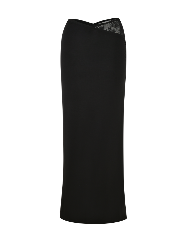 The EMERI SKIRT - BLACK by TIGERMIST is a fitted, knee-length black skirt made from stretchy fabric with subtle lace detailing at the top edge.