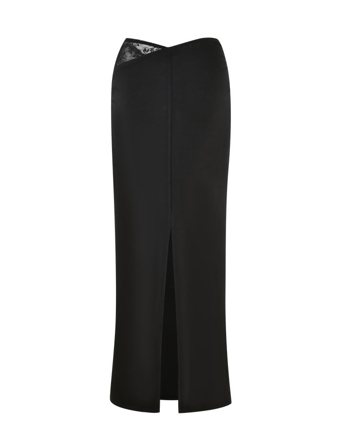 The EMERI SKIRT by TIGERMIST is a long black skirt with a high waist, back slit, shiny waistband detail, and fitted silhouette in stretchy fabric for comfort and style.