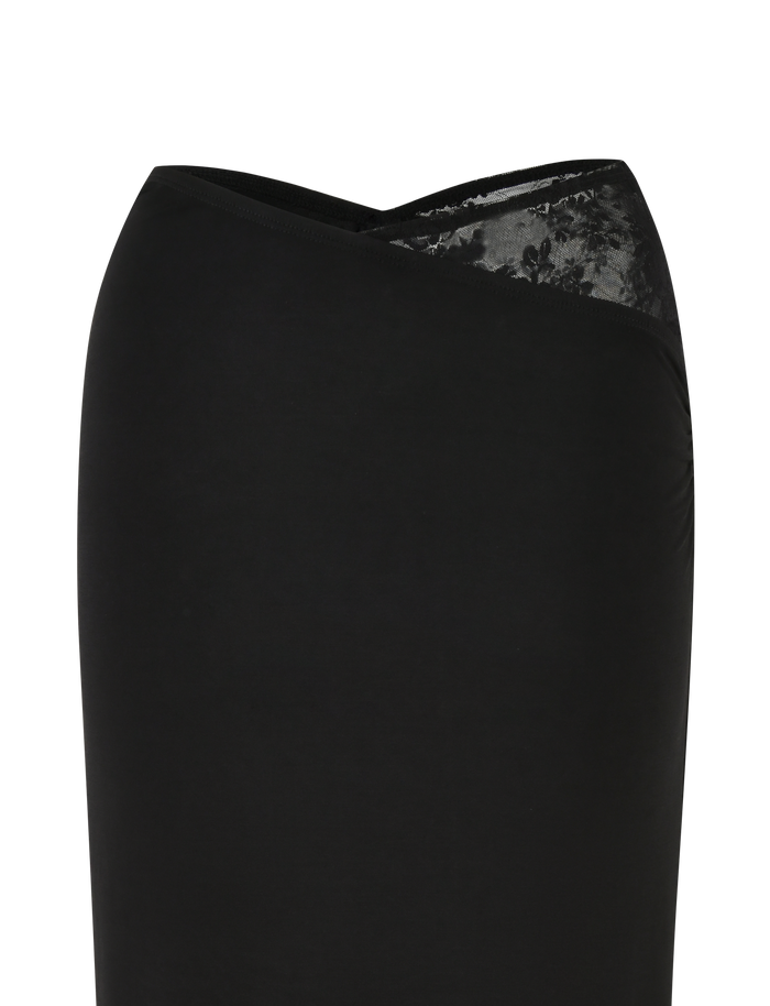 A close-up of the TIGERMIST EMERI SKIRT - BLACK showcases its black wrap design with a floral-patterned lace detail and stretchy fabric.