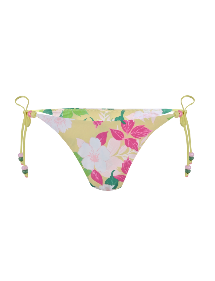 The FINLEA BIKINI BOTTOM - PAISLEY BORDER by TIGERMIST features a cheeky bikini cut with adjustable side ties, crafted from elastane swimwear fabric with a paisley border print, displayed on a white background.