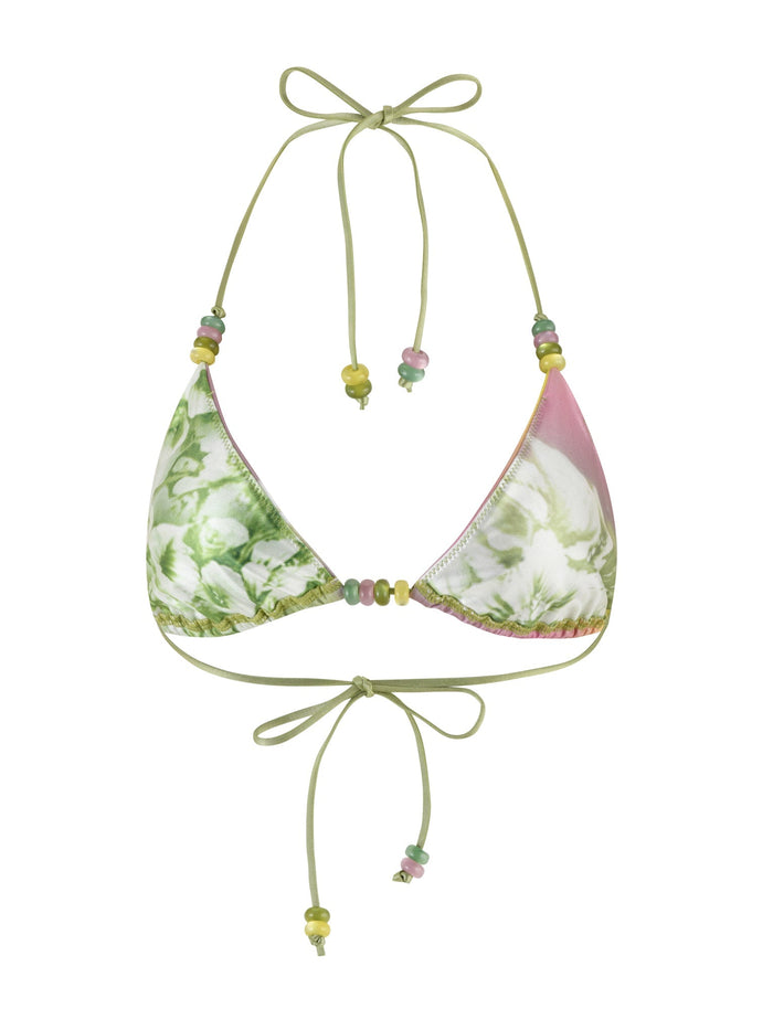 The FINLEA BIKINI TOP - GREEN : FLORAL : STRIPE by TIGERMIST showcases a green and pink floral pattern on a triangle design. The halter is tied with delicate green straps adorned with multicolored beads, and the adjustable band around the chest fastens with matching strings and beads. This tropical print bikini bottom is completed with thin straps embellished with beads.