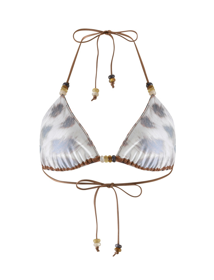 The FINLEA BIKINI TOP by TIGERMIST features a brown and white tie-dye halter design with leopard print accents, brown neck and back ties, and decorative beads for a stylish touch.