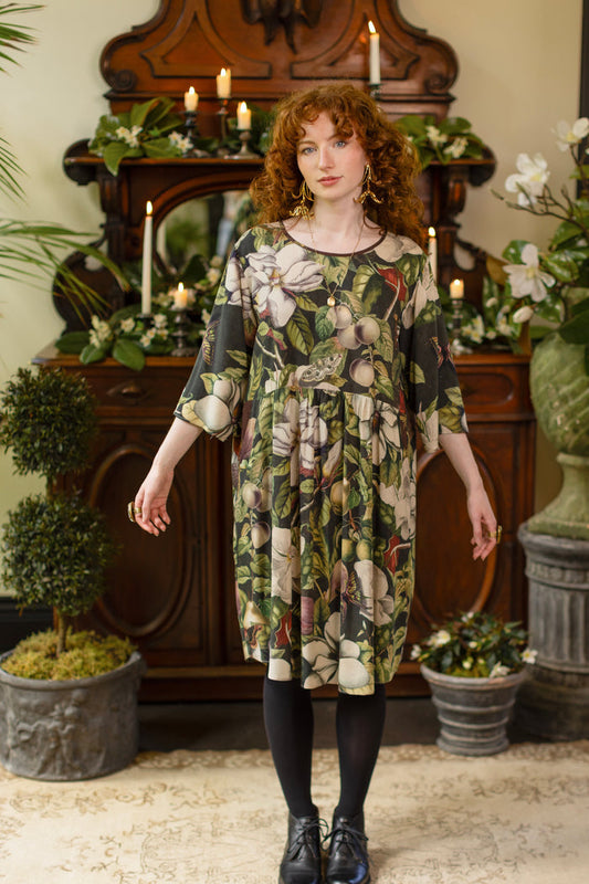Model wearing Fleur De Lune Artist Dress featuring vintage magnolia lithographs, delicate moth etchings and bumblebee detail - inspired by the French chemise - Market of Stars