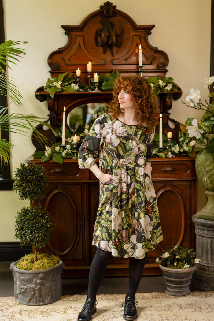 Model wearing Fleur De Lune Artist Dress featuring vintage magnolia lithographs, delicate moth etchings and bumblebee detail - inspired by the French chemise - Market of Stars