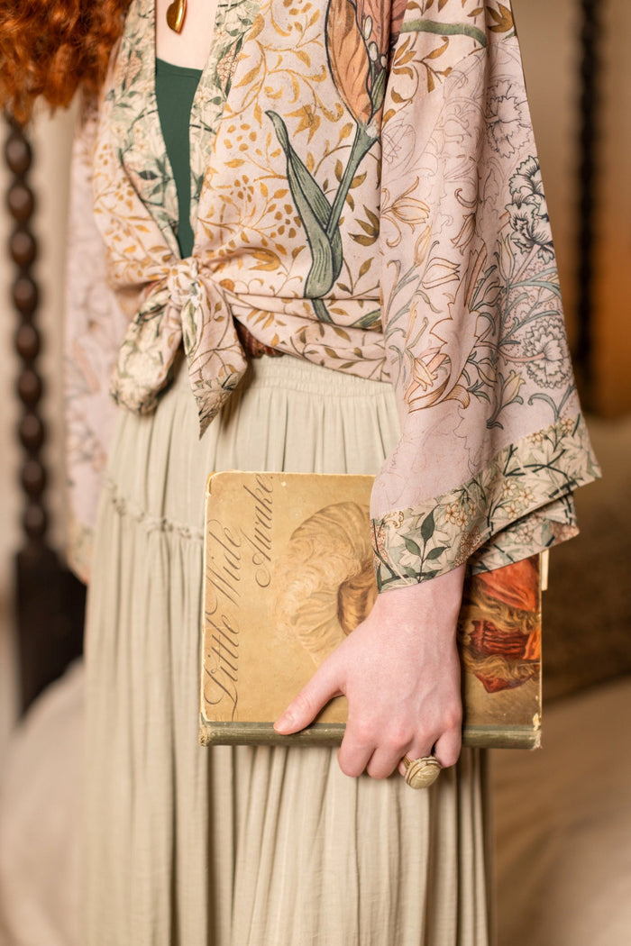 Model wearing full-length Folklore opera duster featuring Bird-of-Peace embroidery and unfinished William Morris textile panels in soft earthy tones – Market of Stars.