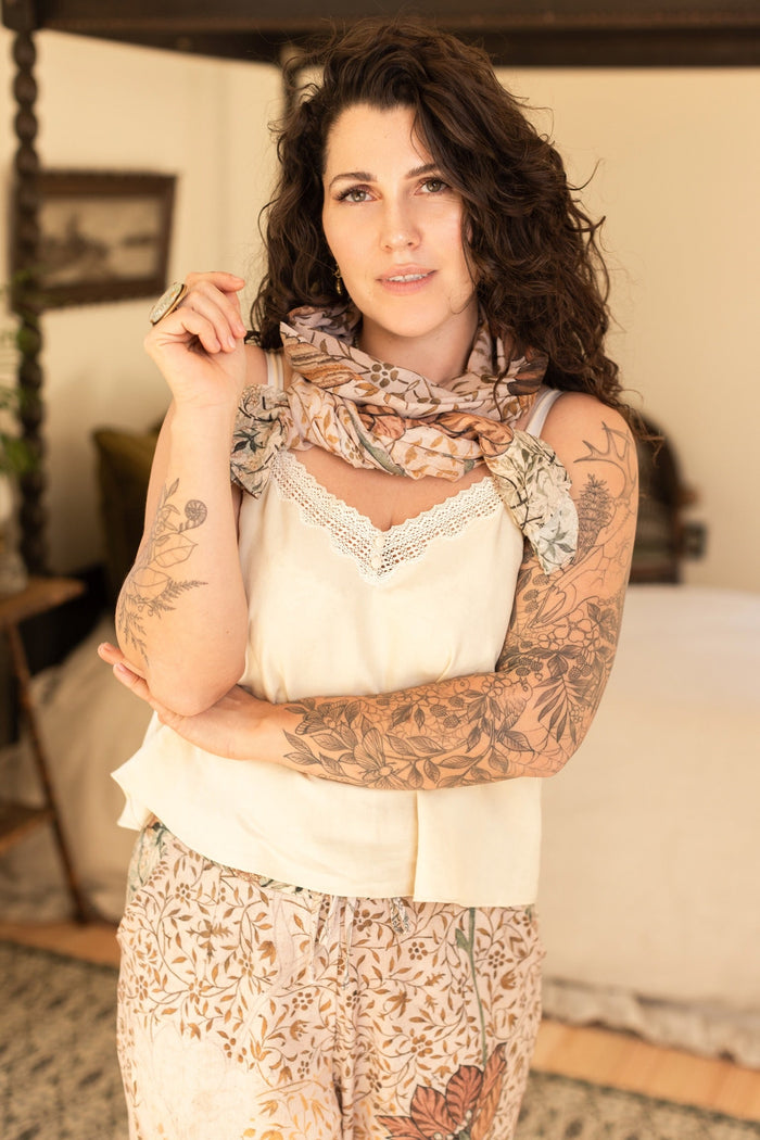Model wearing soft bamboo viscose scarf featuring embroidered Bird-of-Peace and unfinished William Morris artwork inspired by the Arts and Crafts movement – Market of Stars.