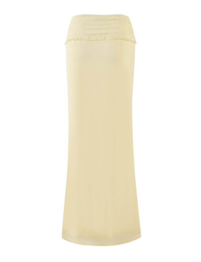 Introducing the GINNY MAXI SKIRT - YELLOW : LEMON by TIGERMIST: a knee-length delight in light yellow with a smooth texture and subtle pleats at its wide waistband, beautifully showcased against a white background.