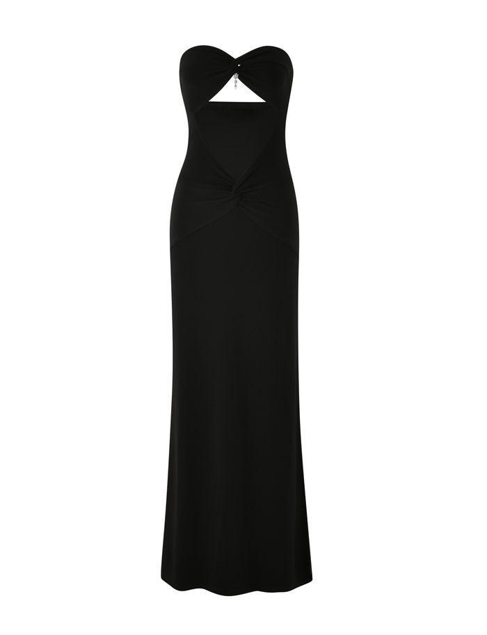 The TIGERMIST GRAZIA DRESS - BLACK is a strapless, floor-length bandeau maxi in stretch fabric, featuring a sweetheart neckline, front cut-out beneath the bust, and gathered waist for a flattering fit.