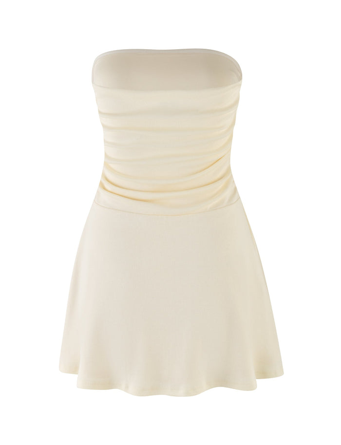 The HARRIETT RIB MINI DRESS - CREAM by TIGERMIST is a strapless mini dress with a fitted, ruched bodice in ribbed fabric and a flared skirt, set against a plain white background.