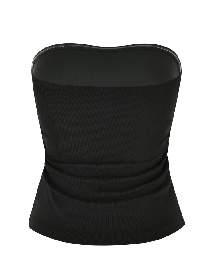 A sleek and fitted black strapless tube top featuring a bodycon silhouette that extends to the waist, making it versatile for various outfits. This stylish piece, known as the HARRIETT RIB TUBE TOP - BLACK by TIGERMIST, showcases a simple yet sophisticated front view in the image provided.