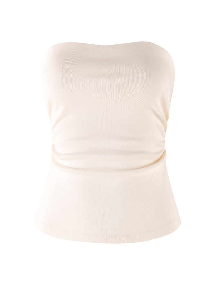A strapless, off-white HARRIETT RIB TUBE TOP - WHITE : CREAM from TIGERMIST, featuring a fitted, ruched design at the sides. The fabric is smooth and slightly stretchy, embodying a casual, minimalist style with a bodycon silhouette against a plain white background.