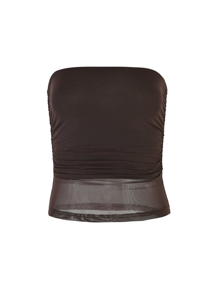 The TIGERMIST HARRIETT TUBE TOP in Chocolate is a strapless brown piece with a bodycon fit, featuring a ruched texture around the midsection and mesh fabrication at the sheer panel along the hem.